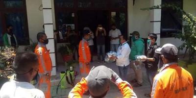 DPC PKB Kota Kotamobagu Bagikan Masker ke Petugas Kebersihan  